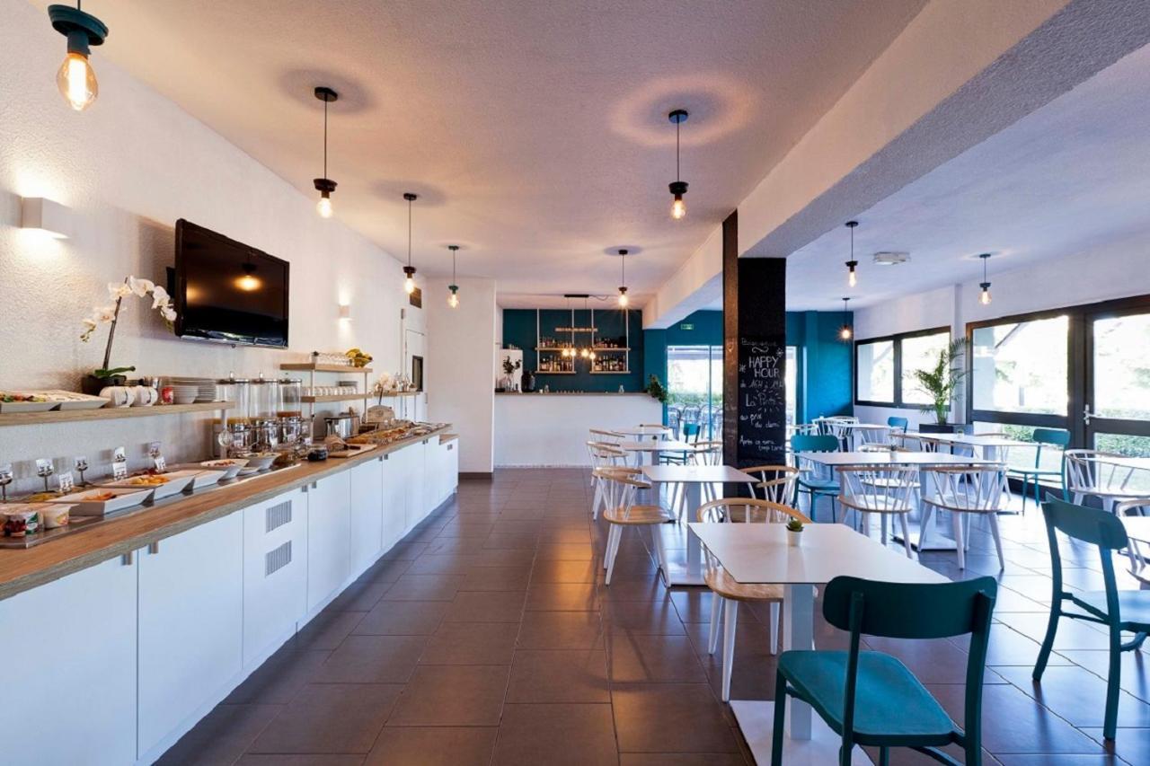Kyriad Lyon Sud - Saint Genis Laval Exterior photo